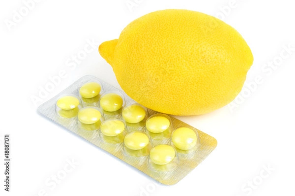 Fototapeta Natural & synthetic vitamins: lemon & poly-vitamins on white