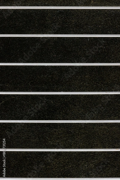 Obraz Shiny metal parallel lines on dark background
