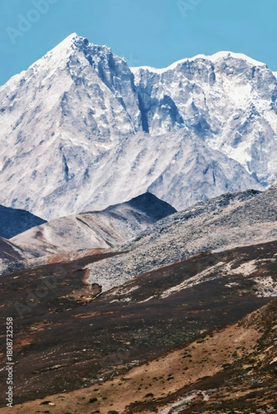 Obraz Majestic Snow-Capped Alpine Peaks Above Barren Desert Highlands