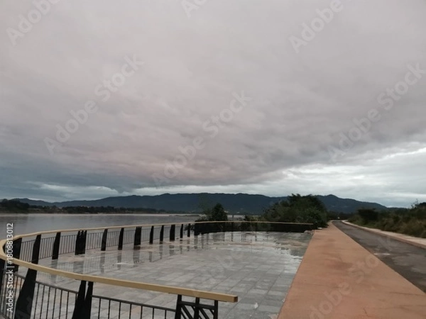 Obraz balcony along riverview on cloudy sky background