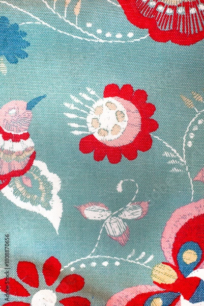 Fototapeta Blue and red floral print with a hummingbird and butterflies