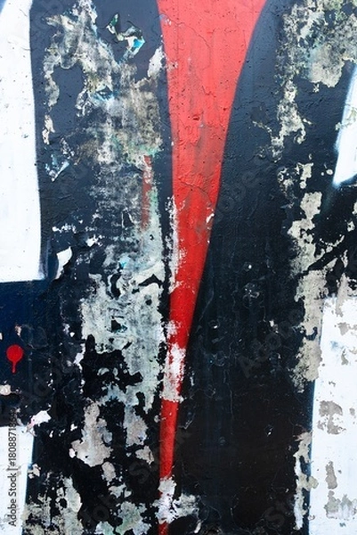 Obraz Abstract weathered wall art with red, black, white tones. Grunge 90s style, distressed texture, urban decay. Background, texture, urban design, creative banner, modern 90s style.