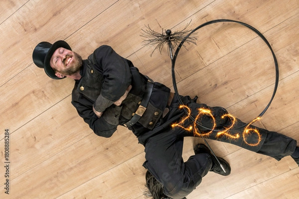 Obraz Glücksbringer für das  neue Jahr 2026, Schornsteinfeger in Arbeitskleidung mit 2026 , geschrieben mit Sternspritzer.