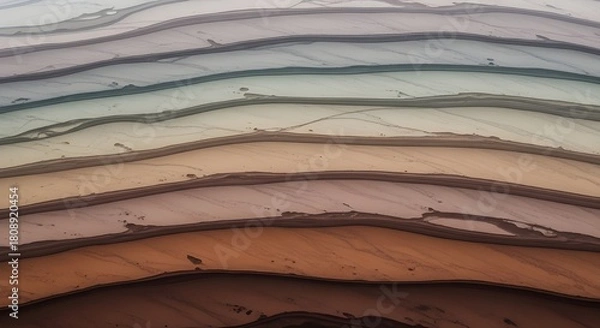 Fototapeta Abstract background resembling aerial views of layered geological formations or desert sand dunes, featuring wavy horizontal lines in muted beige, brown, and subtle grey tones.