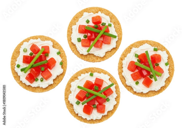 Obraz Isolated appetizer crackers with cream cheese, diced tomatoes, and chives delicious snacks