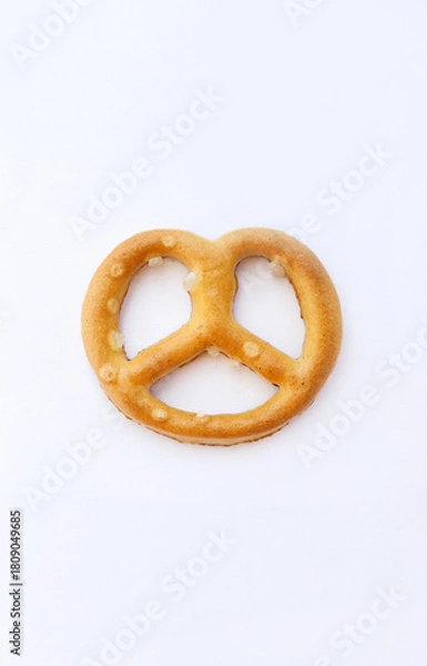 Fototapeta Salted pretzel on a white background. Isolate