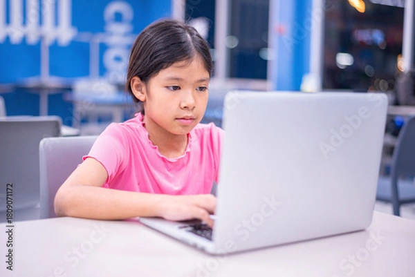 Obraz Student Engaged with Technology in a Modern Learning Environment