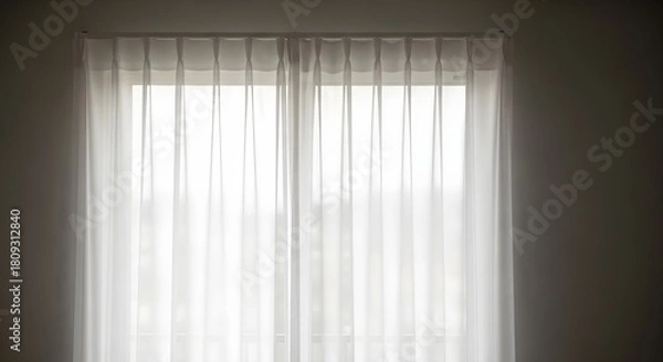 Obraz Sheer white curtains covering window letting in soft natural light indoors