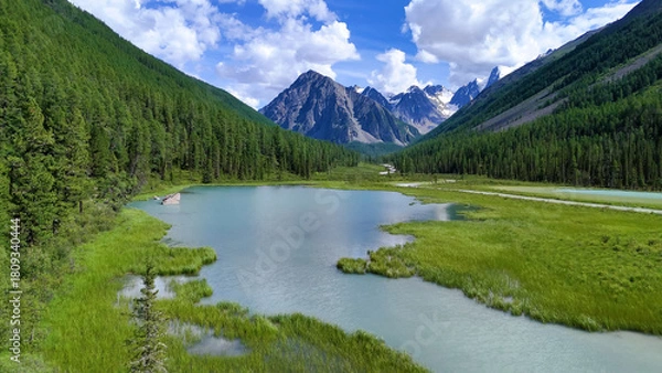 Fototapeta Drone flight over a mountain lake - Shavlinskoye blue lake in Altai