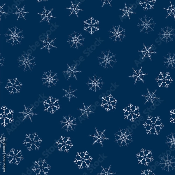 Fototapeta abstract seamless pattern made of snowflakes on blue. Christmas background for design of posters, postcards, invitation for the new year.