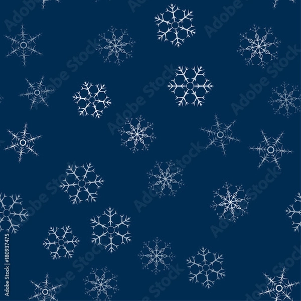 Fototapeta abstract seamless pattern made of snowflakes on blue. Christmas background for design of posters, postcards, invitation for the new year.