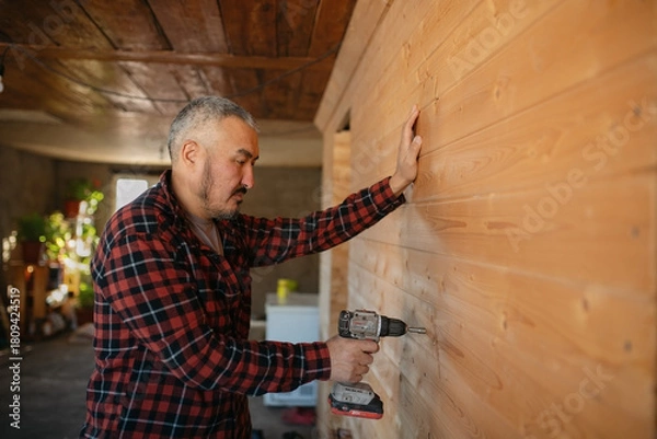 Fototapeta man with drill