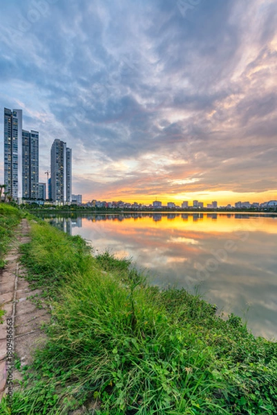 Fototapeta Cau Giay Park Lake Sunset, Hanoi Skyline Reflection