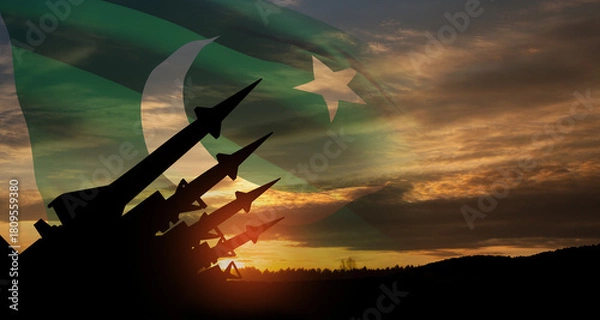 Fototapeta The missiles are aimed at the sky at sunset with Pakistan flag. Nuclear bomb, chemical weapons, missile defense, a system of salvo fire.