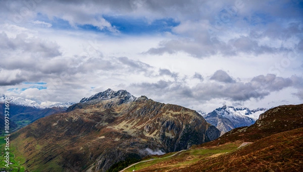 Fototapeta Panoramic view of the Swiss Alps near the municipality of Andermatt in autumn.