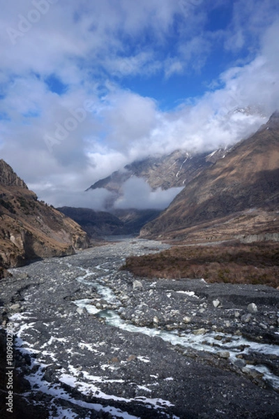 Obraz Mountain river flowing through rocky valley
