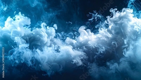 Fototapeta Swirling, ethereal clouds of soft blue and white smoke against a deep blue backdrop creates a dreamlike atmosphere