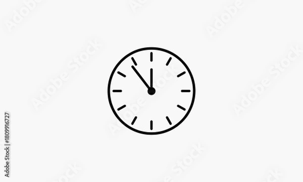 Fototapeta Black outline of a round clock face with twelve hour markers and two hands pointing to eleven oclock on a plain white background