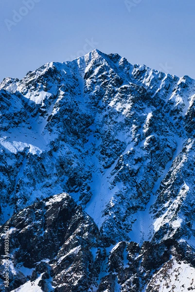 Fototapeta 冠雪の北アルプスの奥穂高岳