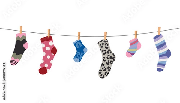 Fototapeta Wool and cotton socks hanging on a rope with clothespins, decorated with playful textures and patterns, perfect for laundry, kids clothing and cozy home decor projects.
