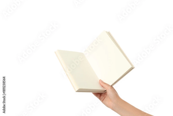 Fototapeta Someone holds a blank book open with one hand, isolated on white, PNG