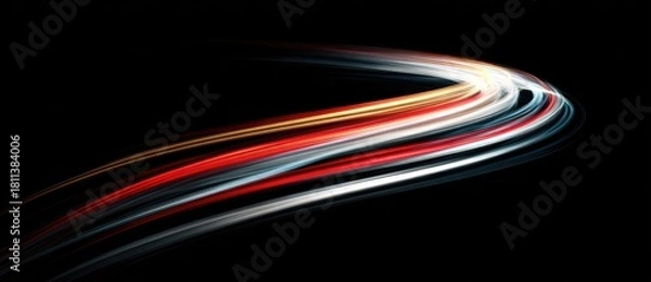 Fototapeta Light trails create dynamic motion in dark space