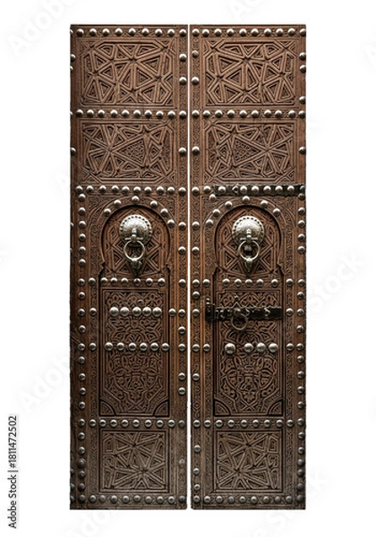 Fototapeta Antique Moroccan carved wooden door with studs. cutout on transparent background