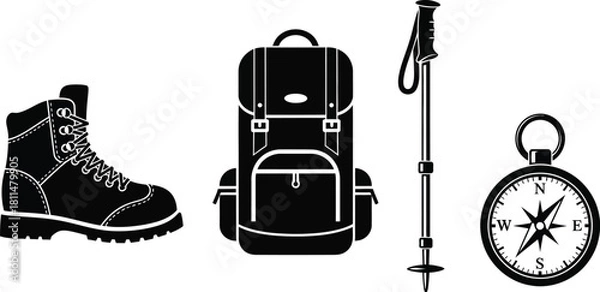 Fototapeta Essential hiking gear including a boot, backpack, trekking pole, and compass