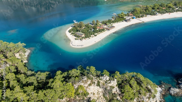 Fototapeta Beautiful aerial landscape capturing the serenity and color tones of Ölüdeniz lagoon.