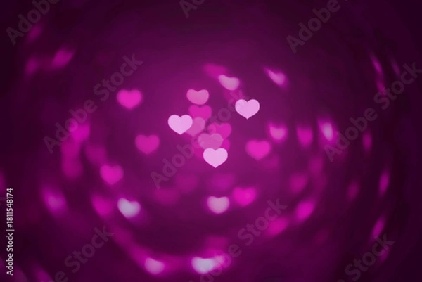 Fototapeta Abstract beautiful blurred brightness pink colored of heart bokeh with swirling background from ornamental lights flickering in the park. The image for Valentine day or Love concept.