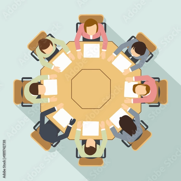 Obraz Overhead view of a diverse business team seated around a large octagonal table, engaged in a professional meeting, discussion, or collaboration at the office