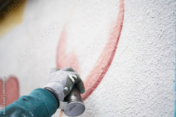 Obraz Painting graffiti on the wall. Close up. 