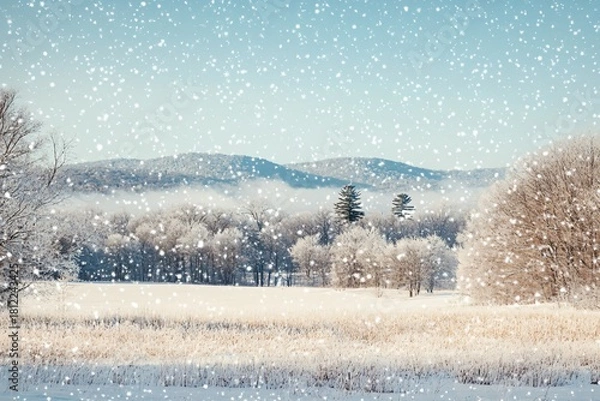 Fototapeta Enchanting winter landscape with falling snow, frosted trees, and distant mountains creating a serene, peaceful atmosphere for seasonal marketing