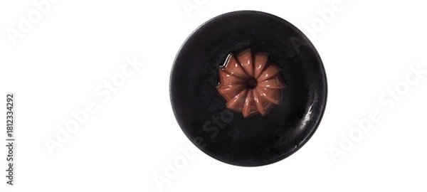 Obraz Chocolate Pudding Dessert Dish on a Black Plate. Food Photography Presentation. Isolated on White Background