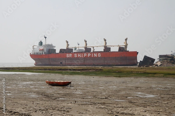 Obraz Cargo vessel run ashore for scrapping