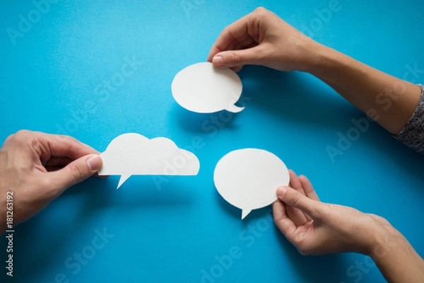 Obraz Hands holding empty speech balloon.