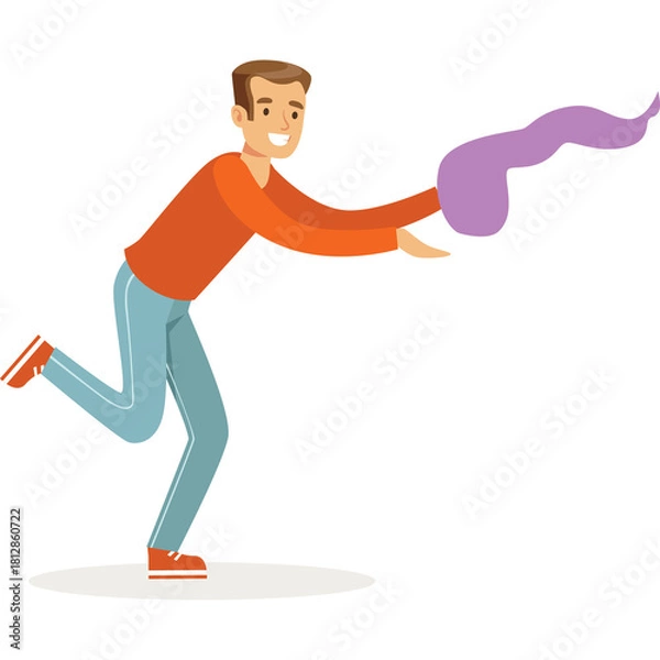 Obraz Smiling Man in Orange Shirt and Blue Jeans Holding a Purple Swirl Object with a Transparent Background for Design Use