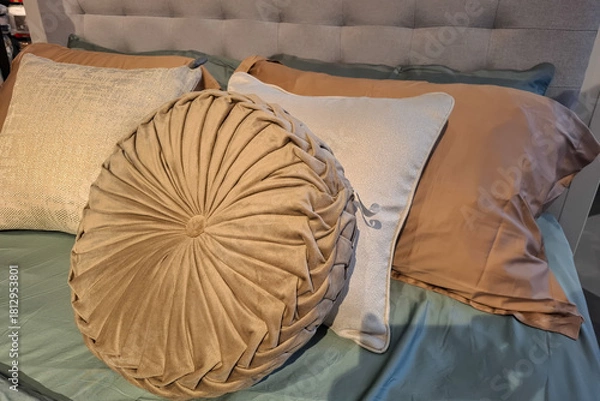 Obraz Close Up Of A Bed With Multiple Cushions And Pillows In Various Textures And Colors.