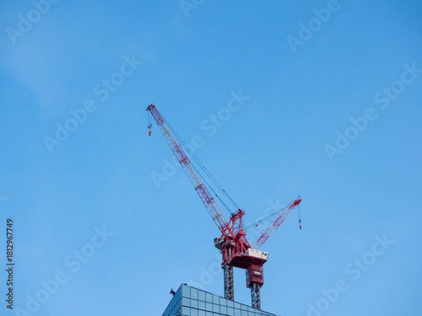 Obraz 建設中のビル屋上のクレーン
