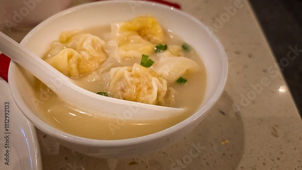 Fototapeta Wonton Soup with Dumplings in Bowl