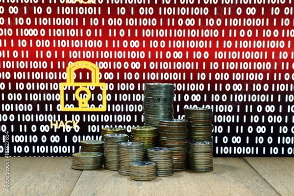 Fototapeta Ekonomia cyfrowa. Układ monety z cyfrowym blokadą i tekstem ransomu na ekranie monitorowania komputera w tle. Koncepcja biznesu, finansów, oprogramowania ransomware i cyberbezpieczeństwa.