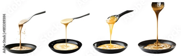 Fototapeta Stream of Delicious Sauces Flowing from Spoons onto Black Plates, Isolated on Transparent Background