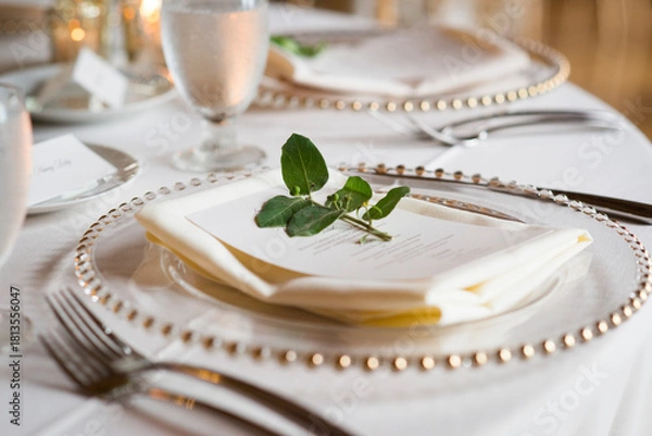 Obraz Minimalist Wedding Place Setting with Greenery Accent