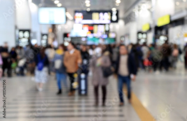 Fototapeta Blur style of many people in the train station at japan. Abstract Background Blurred Image, People hurry at the railway.