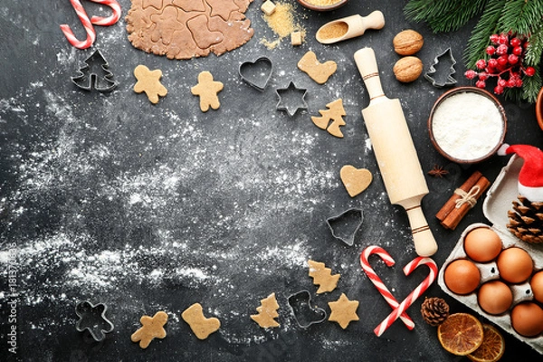 Obraz Baking christmas cookies on grey wooden table