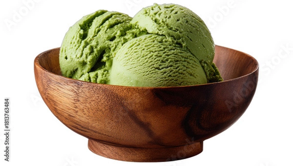 Fototapeta Creamy green scoops of ice cream served in a rustic wooden bowl