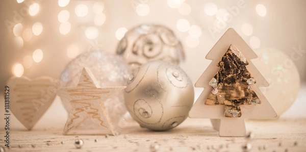 Fototapeta Diferent shaped silver christmas ornaments