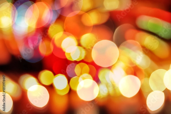 Fototapeta Abstract Christmas lights background, abstract bokeh background with vibrant colorful  blur lights, perfect for festive celebrations