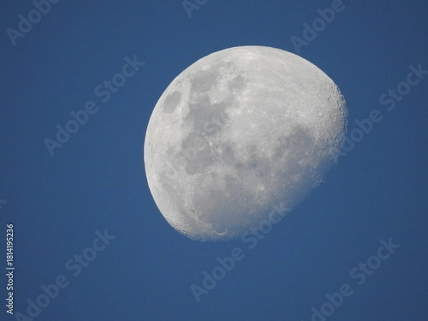 Obraz Waning Gibbous Moon in a Bright Blue Sky