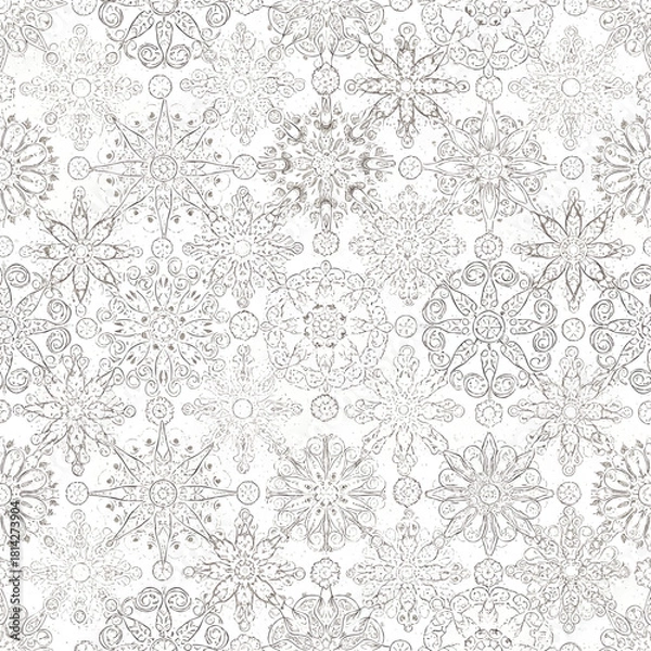 Obraz A repeating pattern of intricately designed snowflakes, varying in size and style, against a white background.